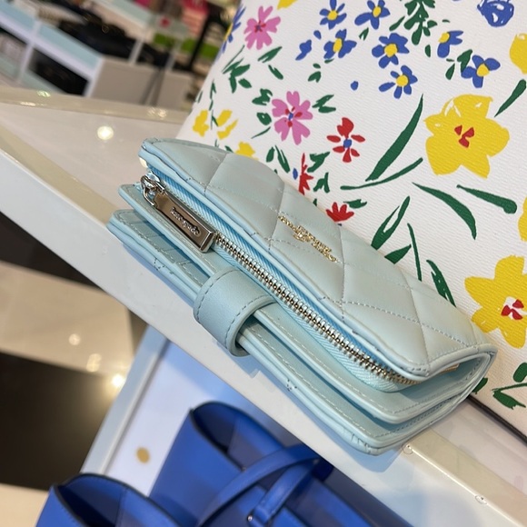 Kate Spade Carey Medium Compartment Bifold Wallet
COLOR: Turquoise - Picture 2 of 16